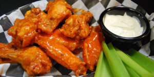 Chicken Wings served at Octane Adrenaline Bar with blue cheese and celery
